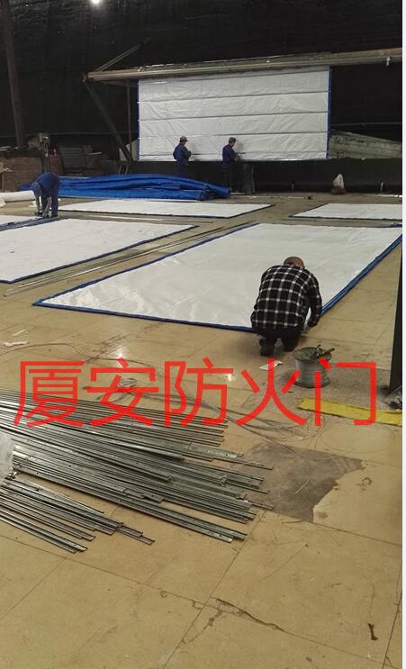 1568103529105569.jpg 防火卷簾簾布生產車間.jpg