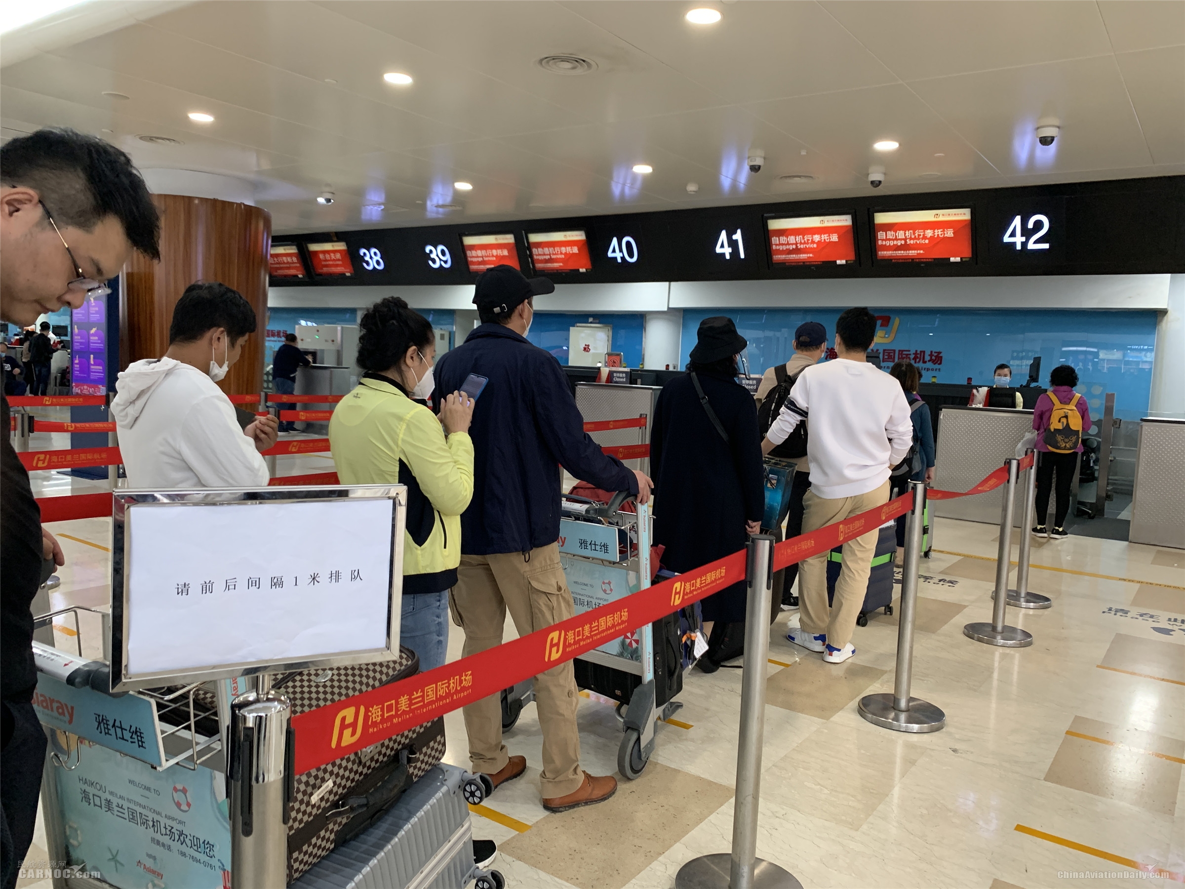 商品編碼查詢-氣溫攀升 客流回暖 ?？诿捞m國(guó)際機(jī)場(chǎng)戰(zhàn)“疫”復(fù)工兩手抓（附圖）